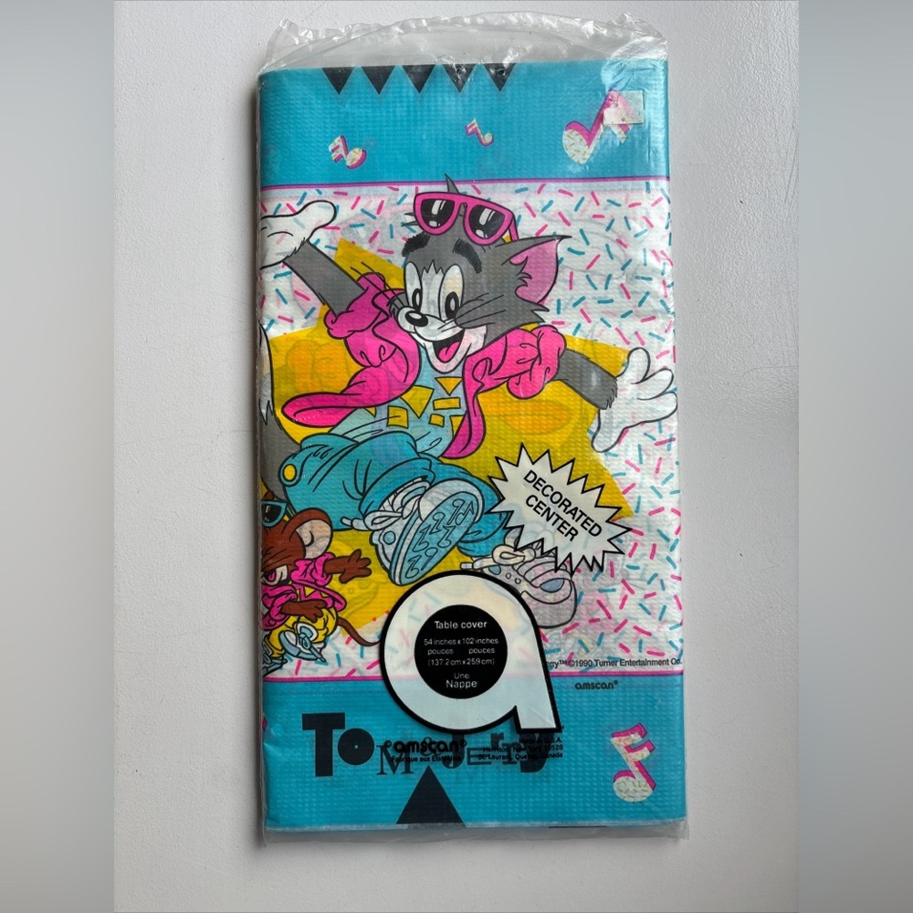 1990 TOM AND JERRY CARTOON 54" BY 102"  TABLE COVER IN ORIGINAL PACKAGE